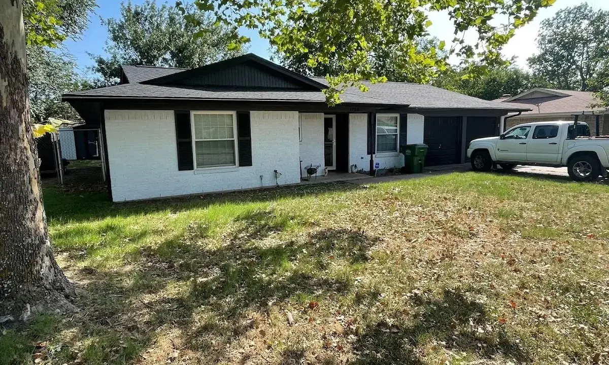 Professional roofing crew working on a residential roof in Margate City